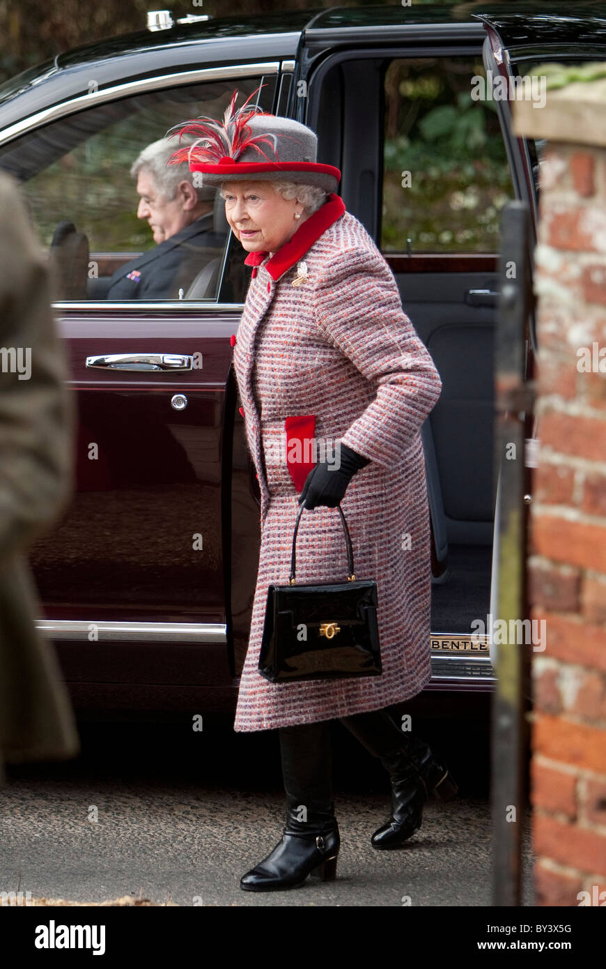 Britain's Queen Elizabeth, accompanied by Prince Philip attends a Sunday morning service in Hillington, Norfolk Stock Photo
