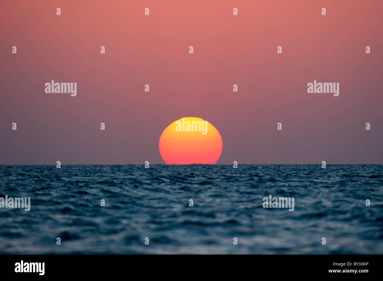 Sunset at sea in Dubai, United Arab Emirates. 16/11/2010 Stock Photo