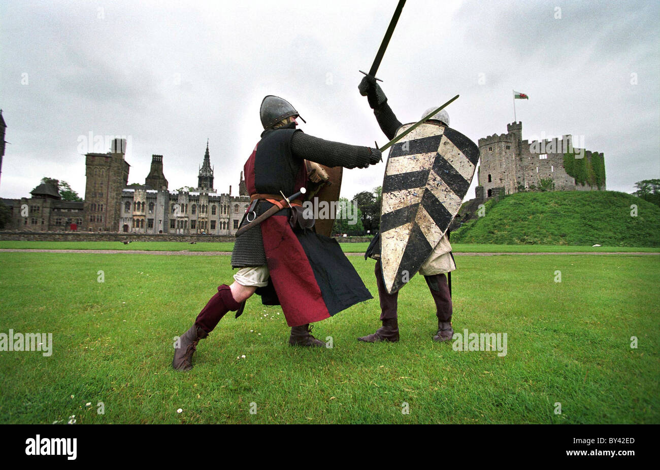 A Norman Soldier sword fight, Cardiff Castle. Stock Photo