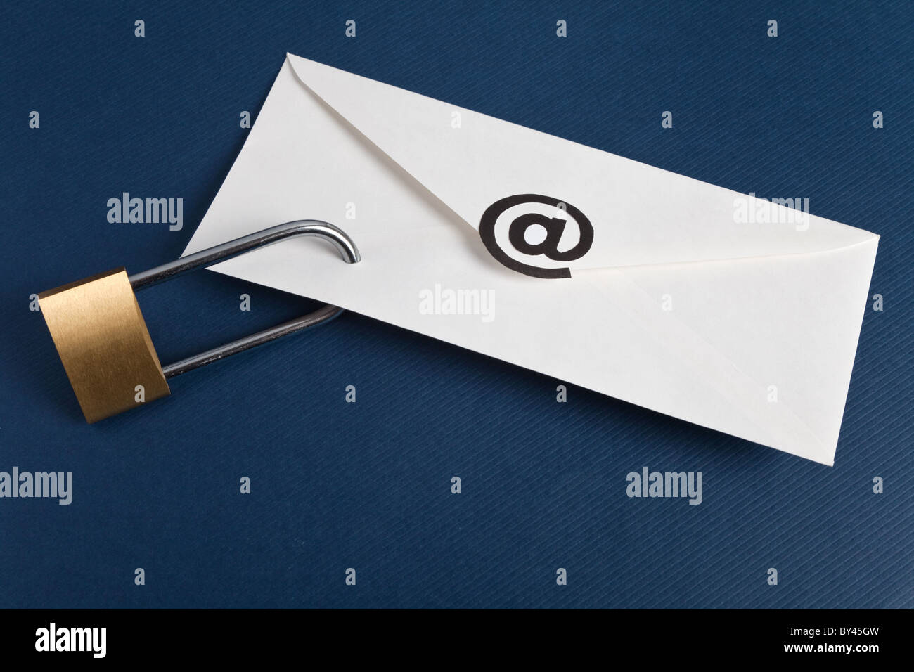 Envelope with @ Symbol and lock, concept of E-Mail Security Stock Photo