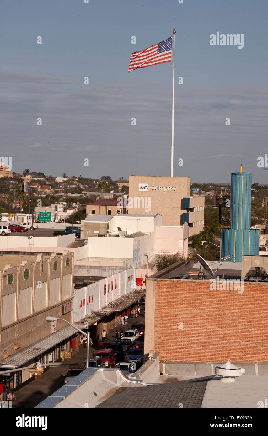 Downtown Laredo, Texas, with large American flag flying from flagpole