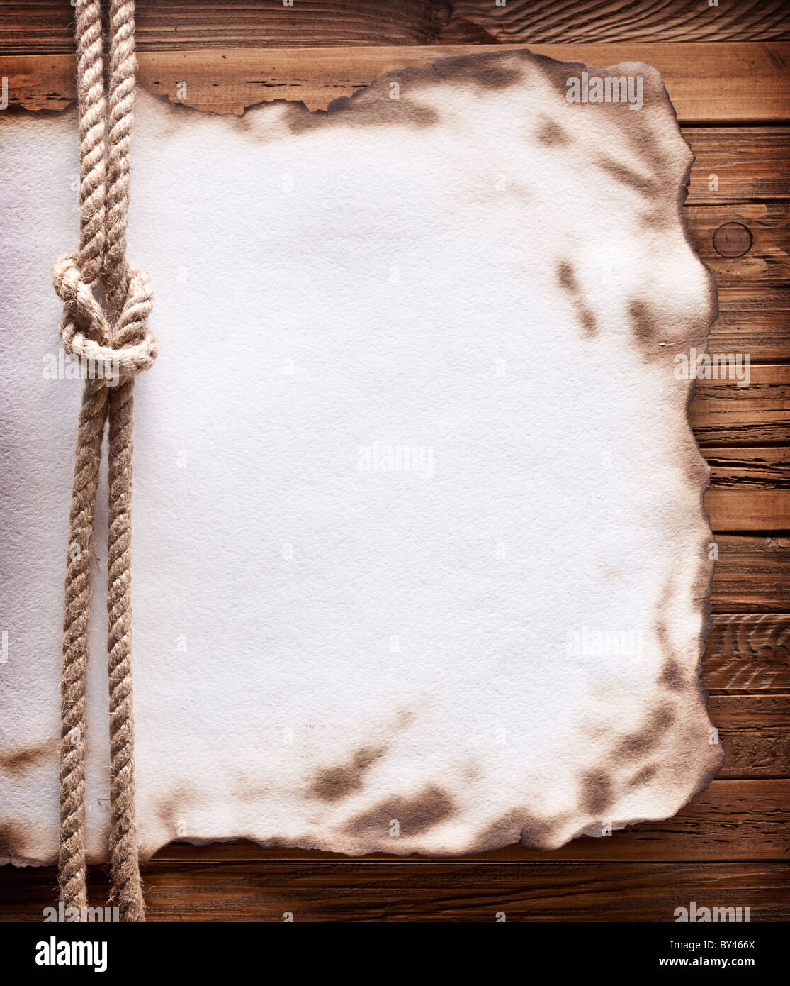 Image of old paper on wood background. Stock Photo