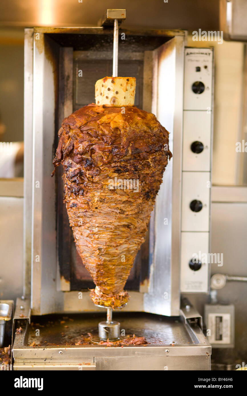 Al pastor pork on the verticle spit at Mi Pueblo Supermarket, San Jose, CA USA Stock Photo Alamy