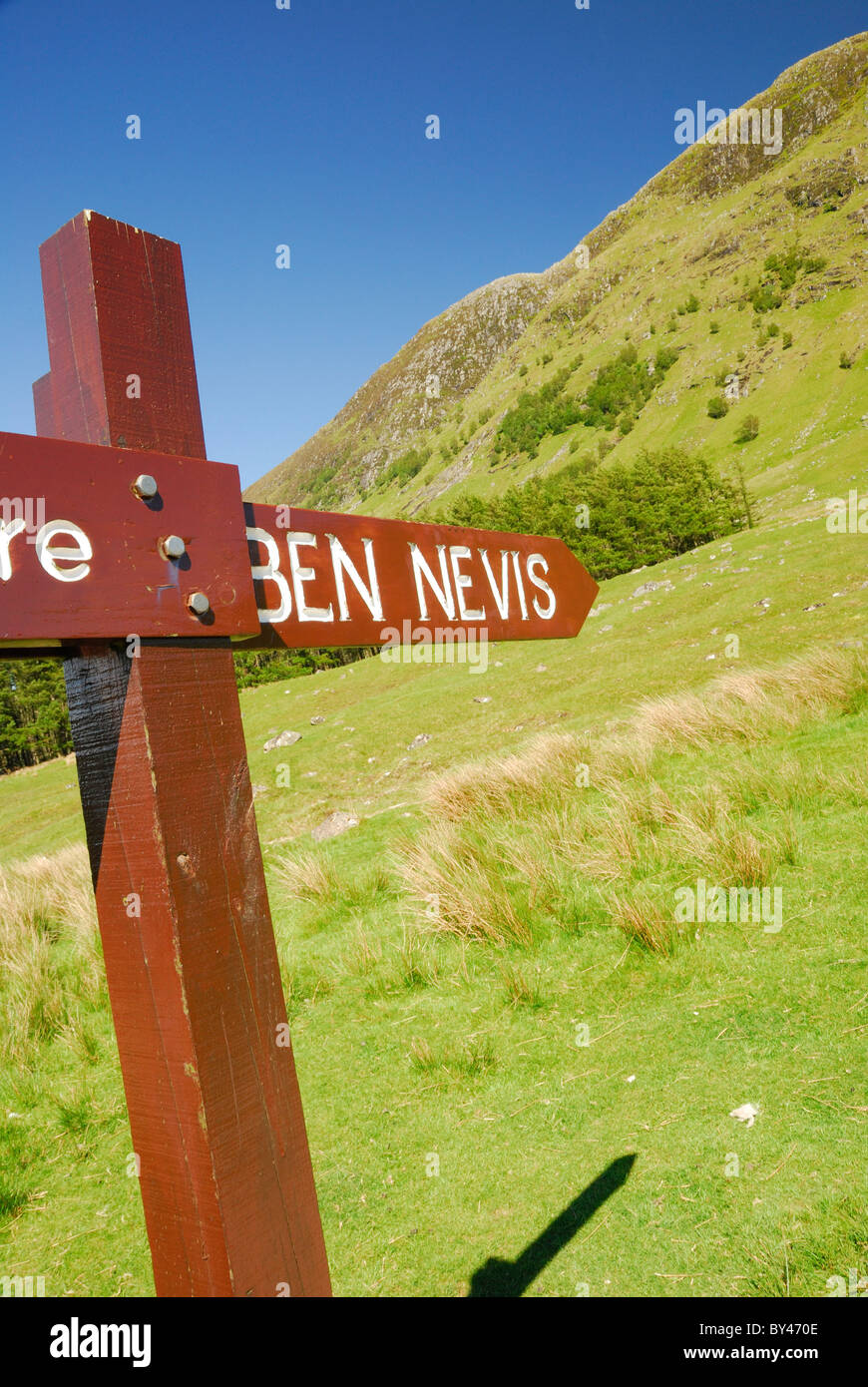 Ben Nevis signpost on a clear day in summer in the Scottish Highlands Stock Photo