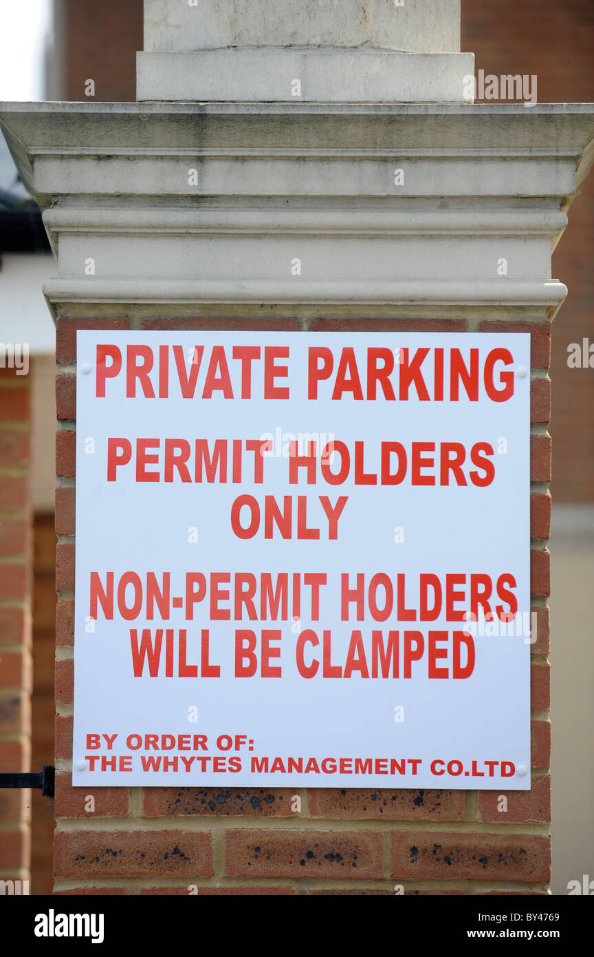 A car clamping company notice in a private car park for residential