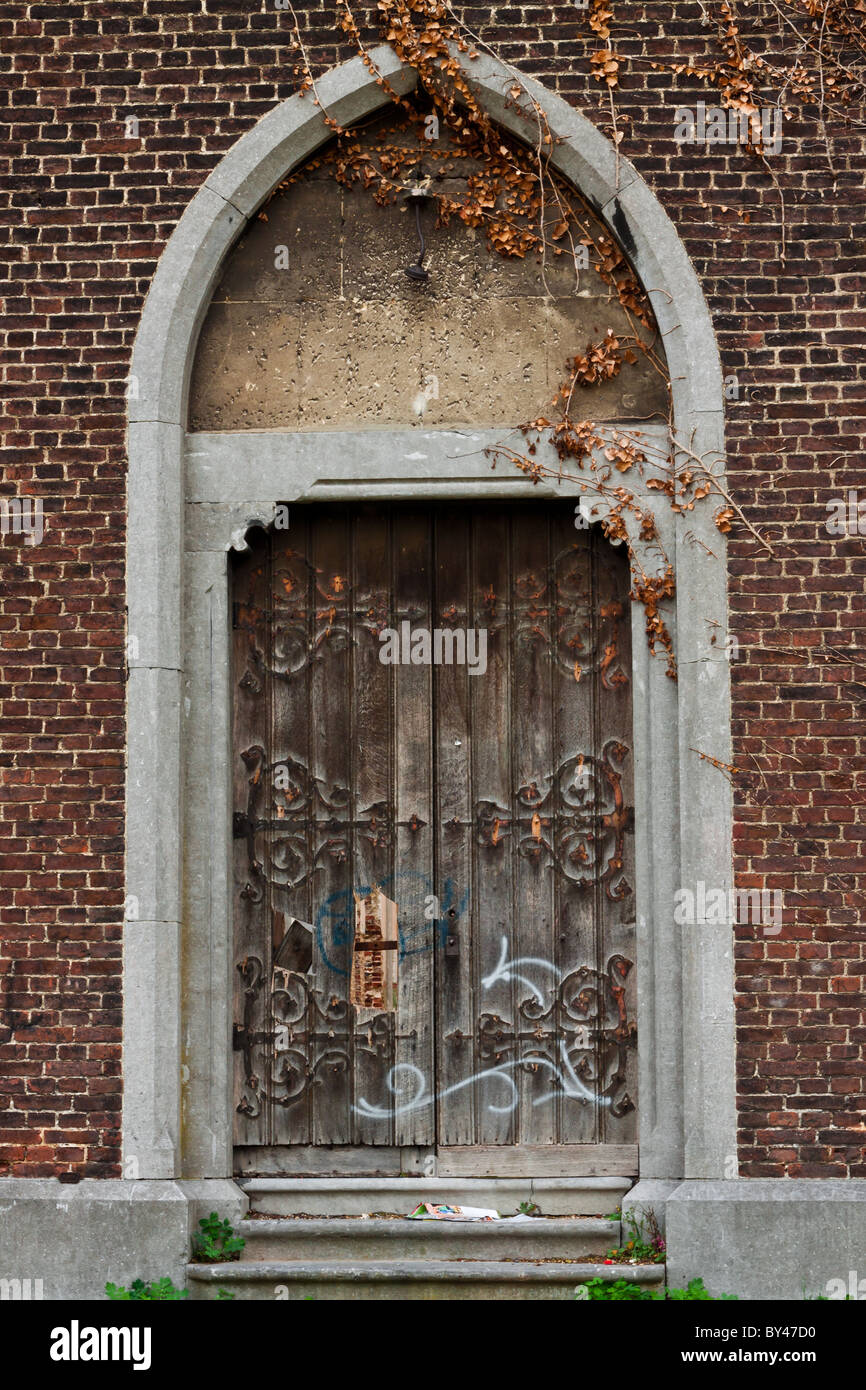 Double door of an old abandoned church. Stock Photo