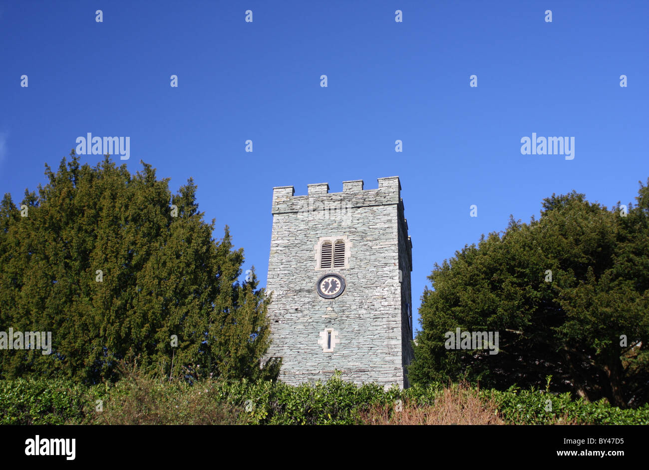 Holy Trinity Church which is at the foot of Silver How and looks over the village of Chapel Stile Stock Photo