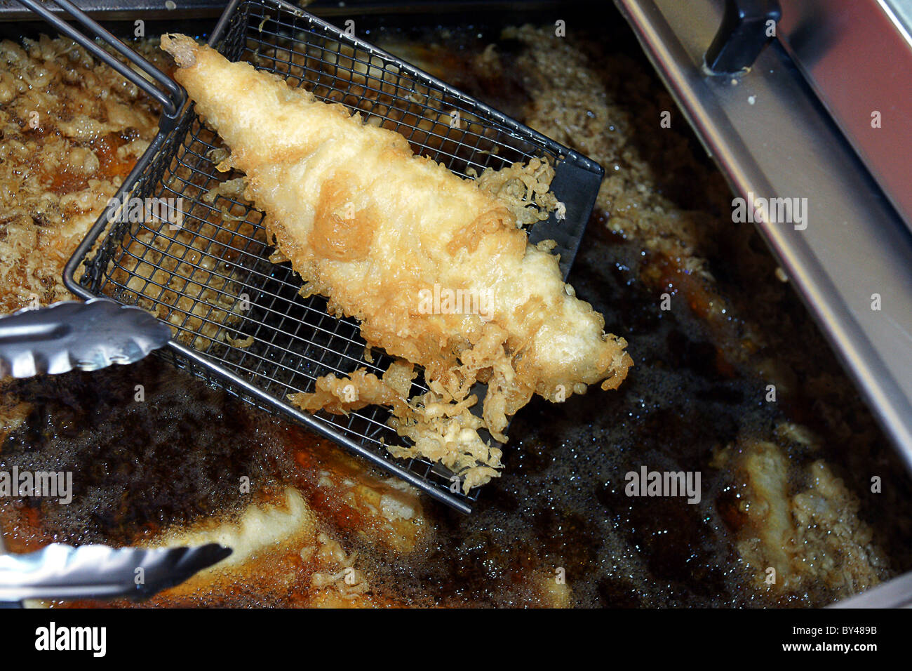 Haddock frying in a fish and chip shop, Whitby Stock Photo Alamy