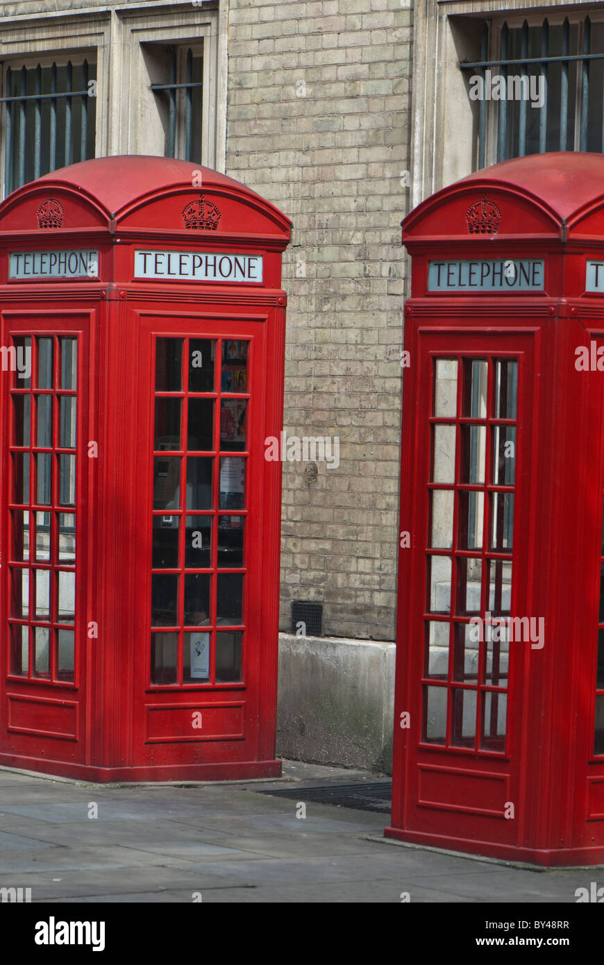 Two 2 Public red telephone boxes Broad Court, Covent Garden, London. Stock Photo