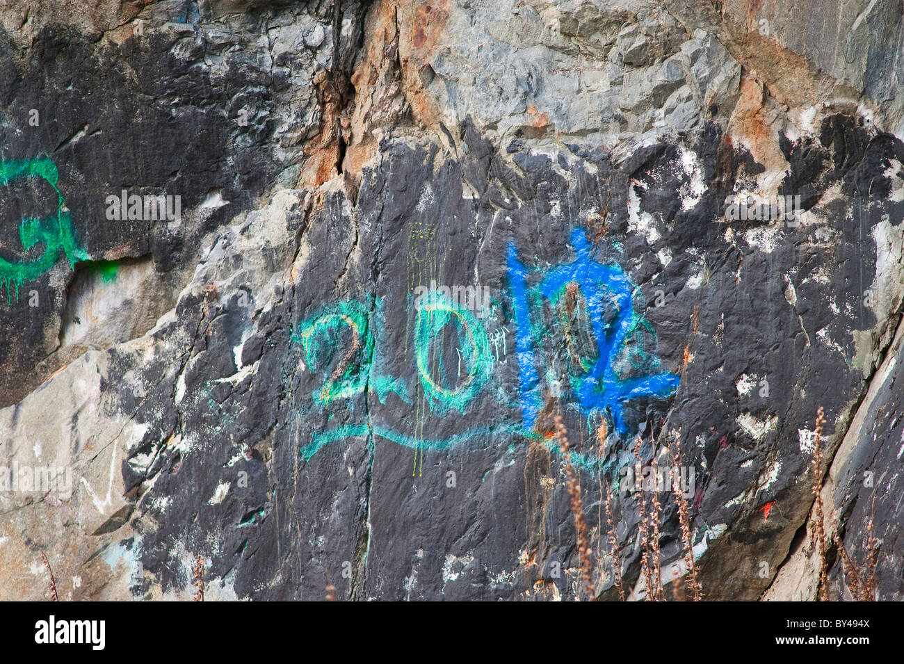 High school senior class graffiti found on the rock cliffs beside