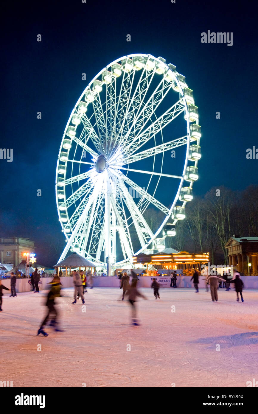 The Big Wheel & Ice Rink at Chester Victorian Christmas Market, Castle Grounds, Chester, Cheshire, England, UK Stock Photo