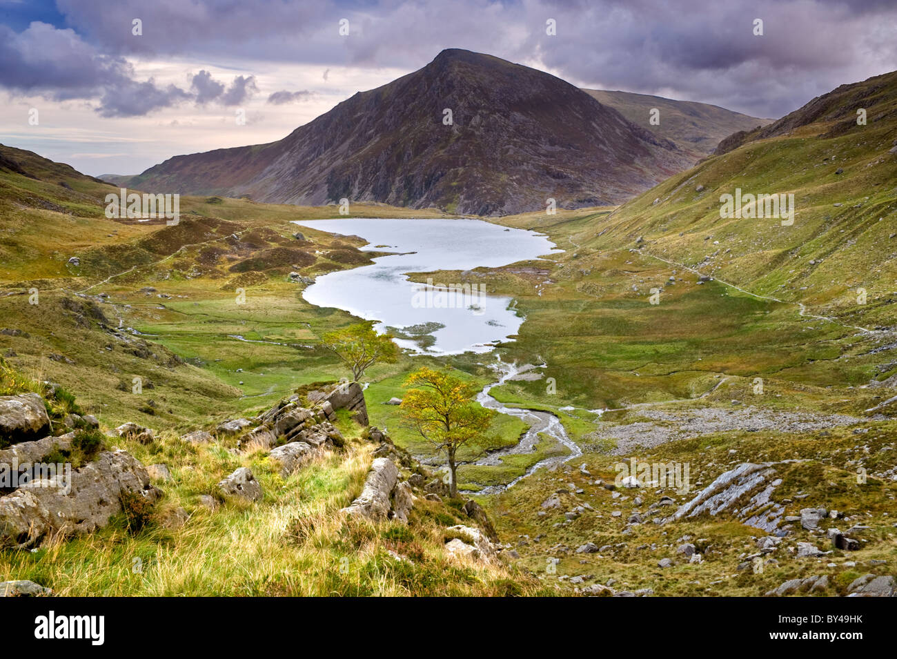 Llyn Idwal in Autumn backed by Pen yr Ole Wen & viewed from The Devils Kitchen, Snowdonia National Park, North Wales, UK Stock Photo