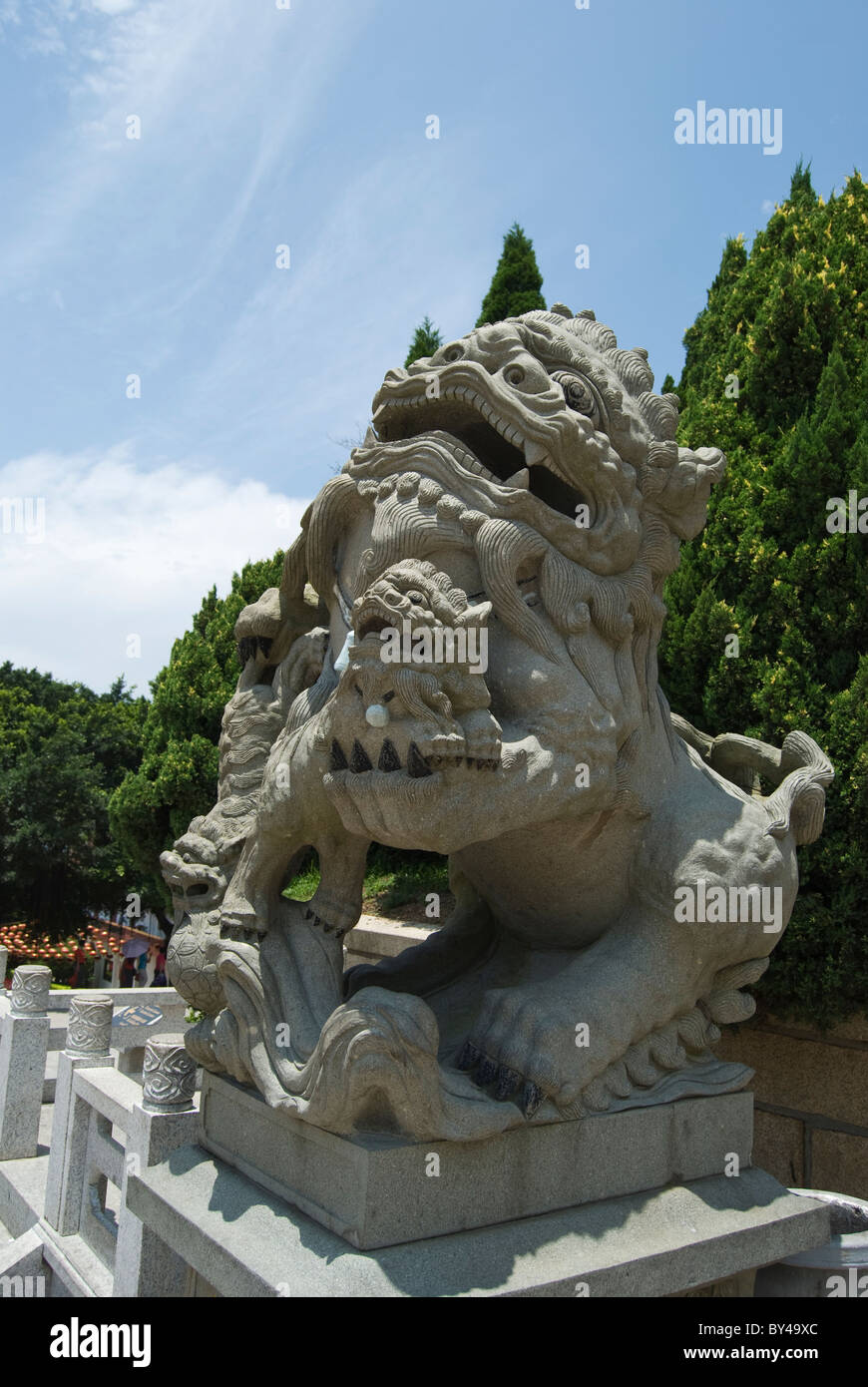 Stone carving Singha as the guardian of the shrine, Meizhou Island, Fujian Stock Photo