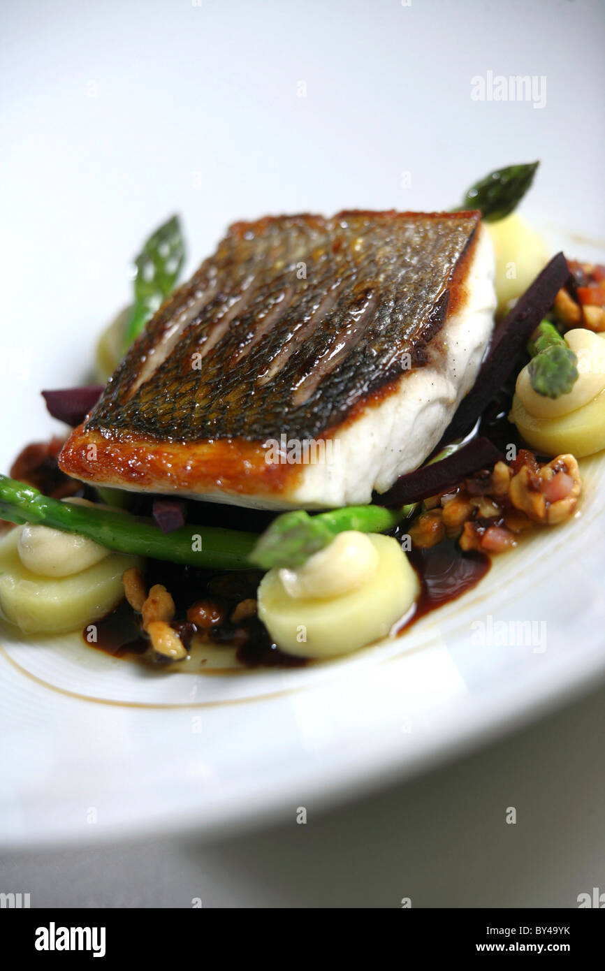 ROASTED CORNISH SEABASS WITH ROASTED CONFIT POTATOES, CREAMED CELERIAC