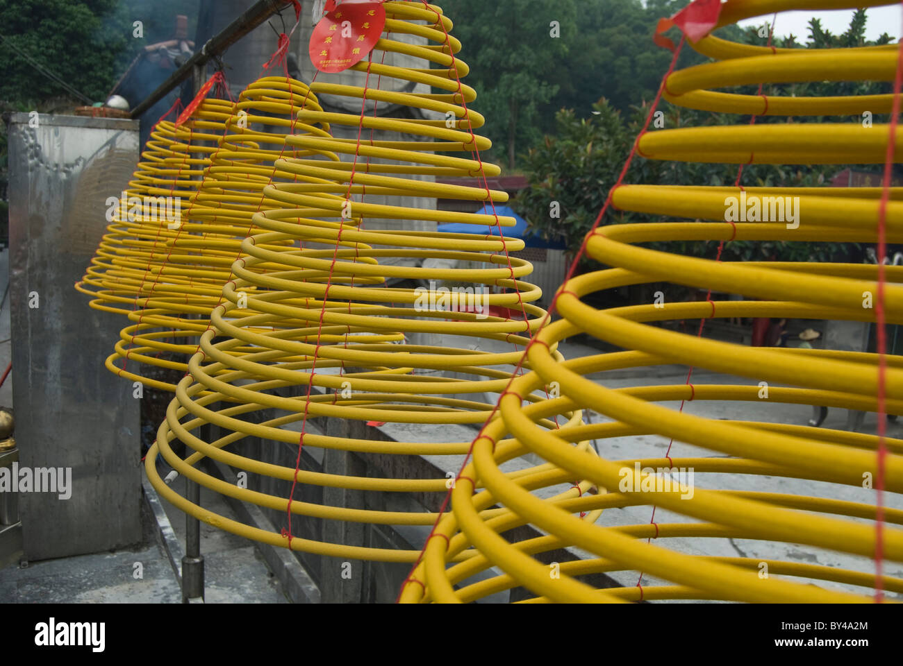 Spiral incenses used to worship Chines gods in a shrine, Shantou, China Stock Photo