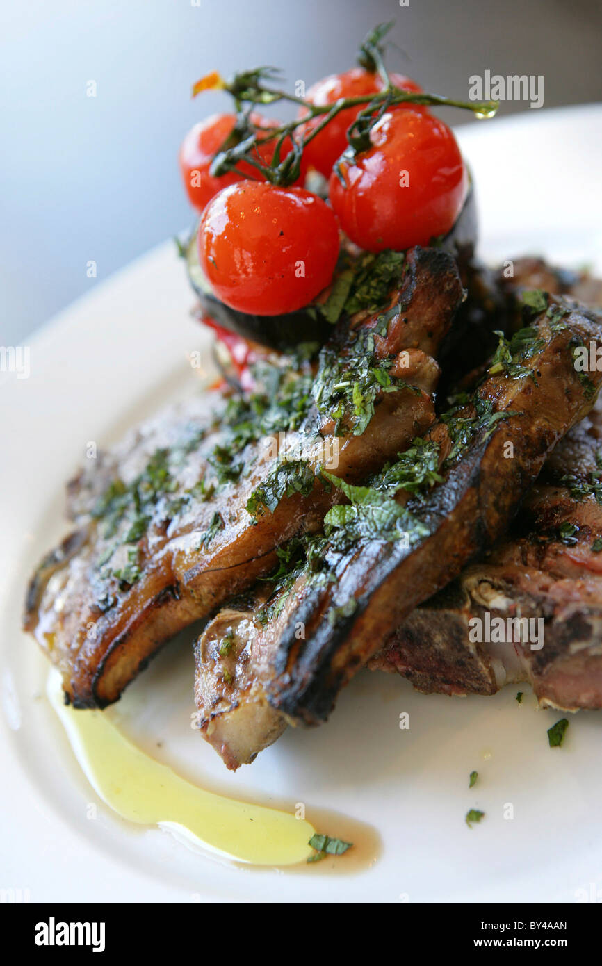 WELSH LAMB CUTLETS WITH MINT OIL Stock Photo