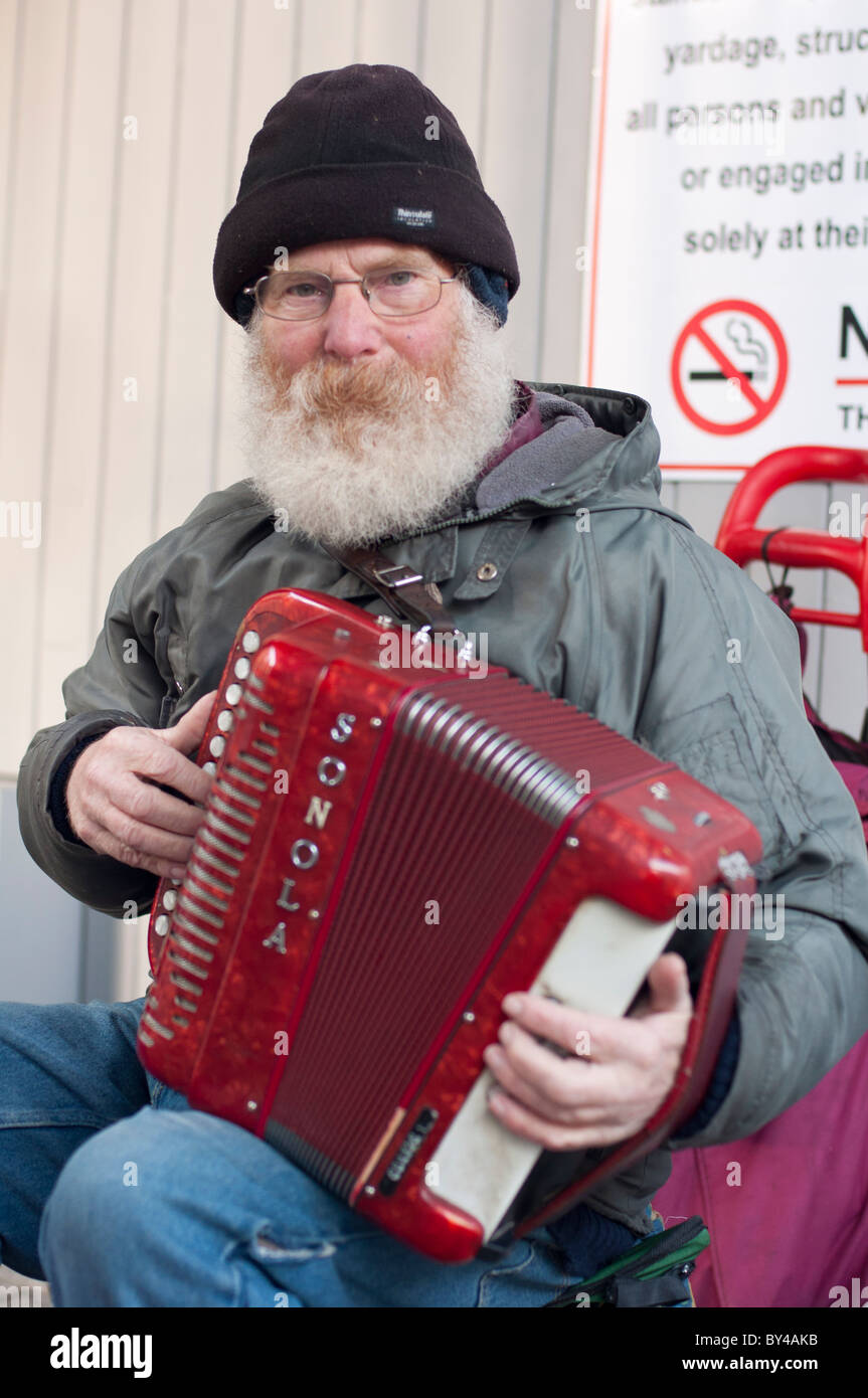 A local character at Limerick city's milk market, Republic of Ireland. Stock Photo