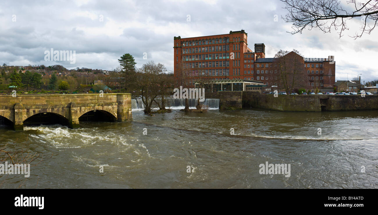 The river Derwent used to provide the power for many mills in Belper and still powers the East Mill Stock Photo