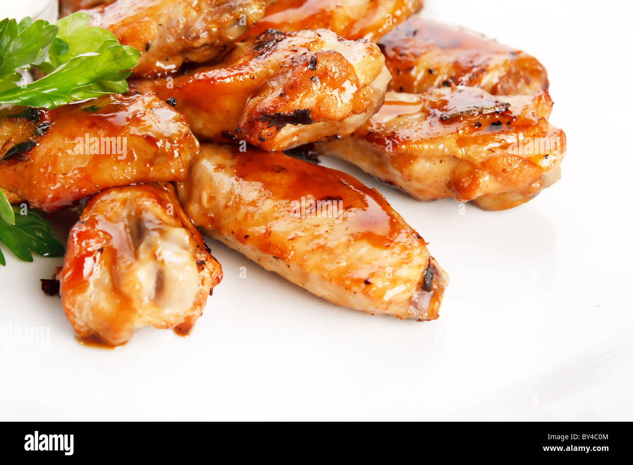 Chicken wings with sauce Stock Photo - Alamy