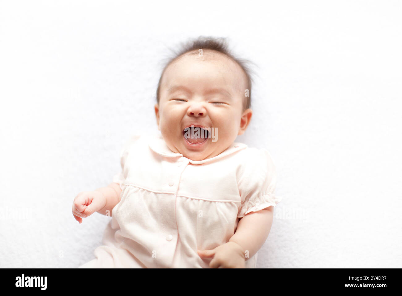 Baby girl laughing Stock Photo Alamy