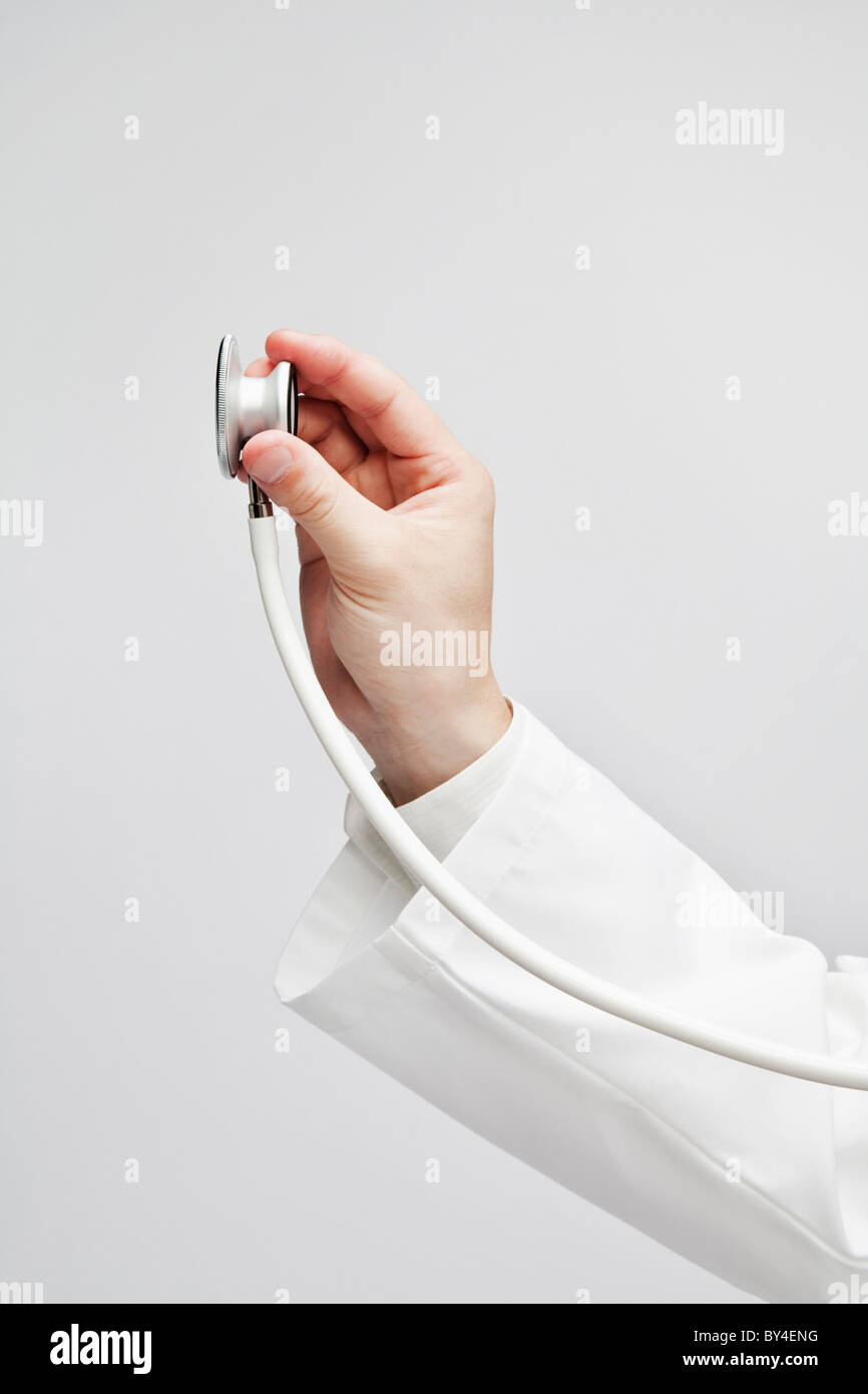 Doctor holding stethoscope in hand hi-res stock photography and images ...