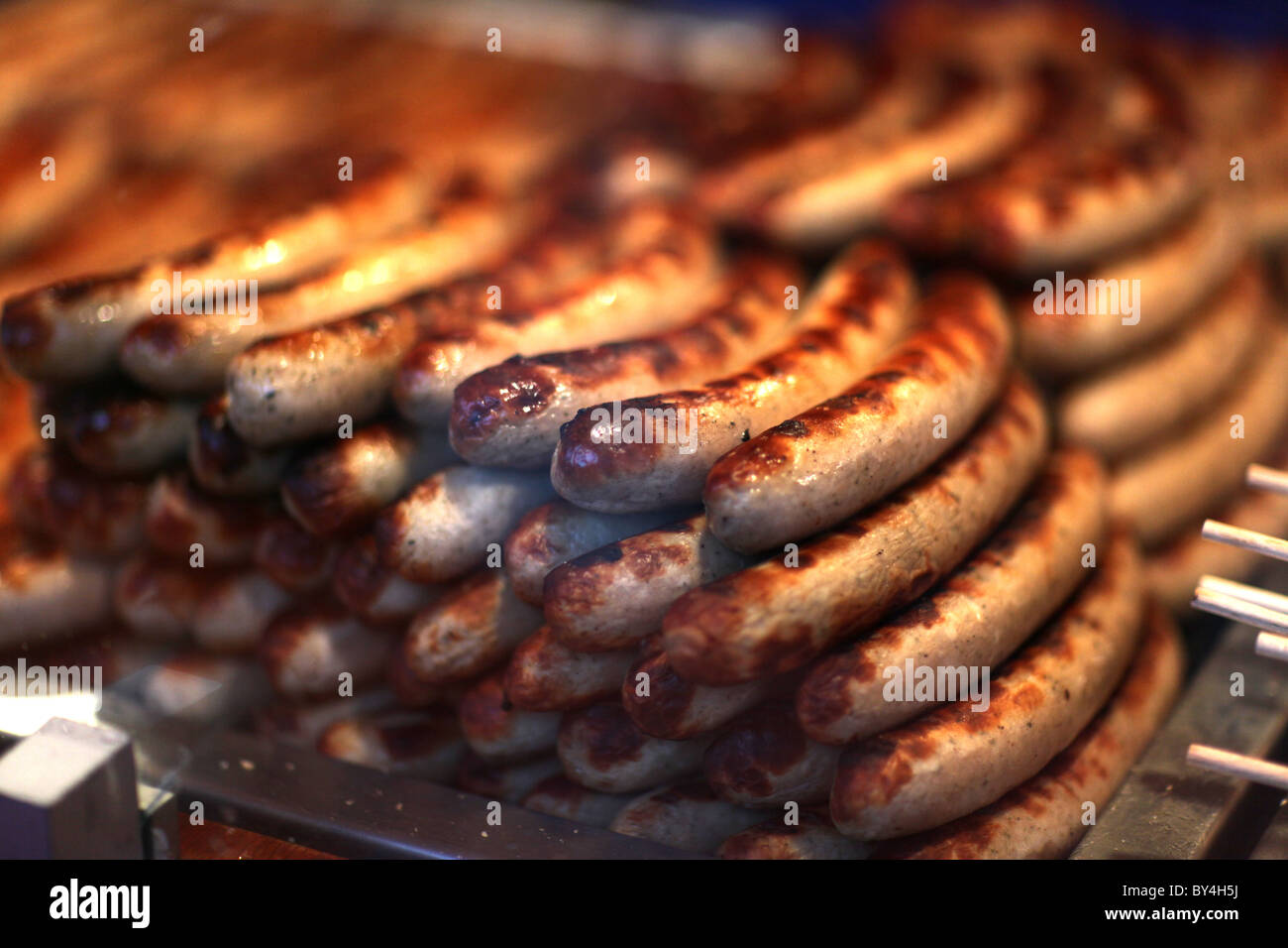 Sausages or brattwurst on display in a Christmas market in central Berlin, Germany. Stock Photo