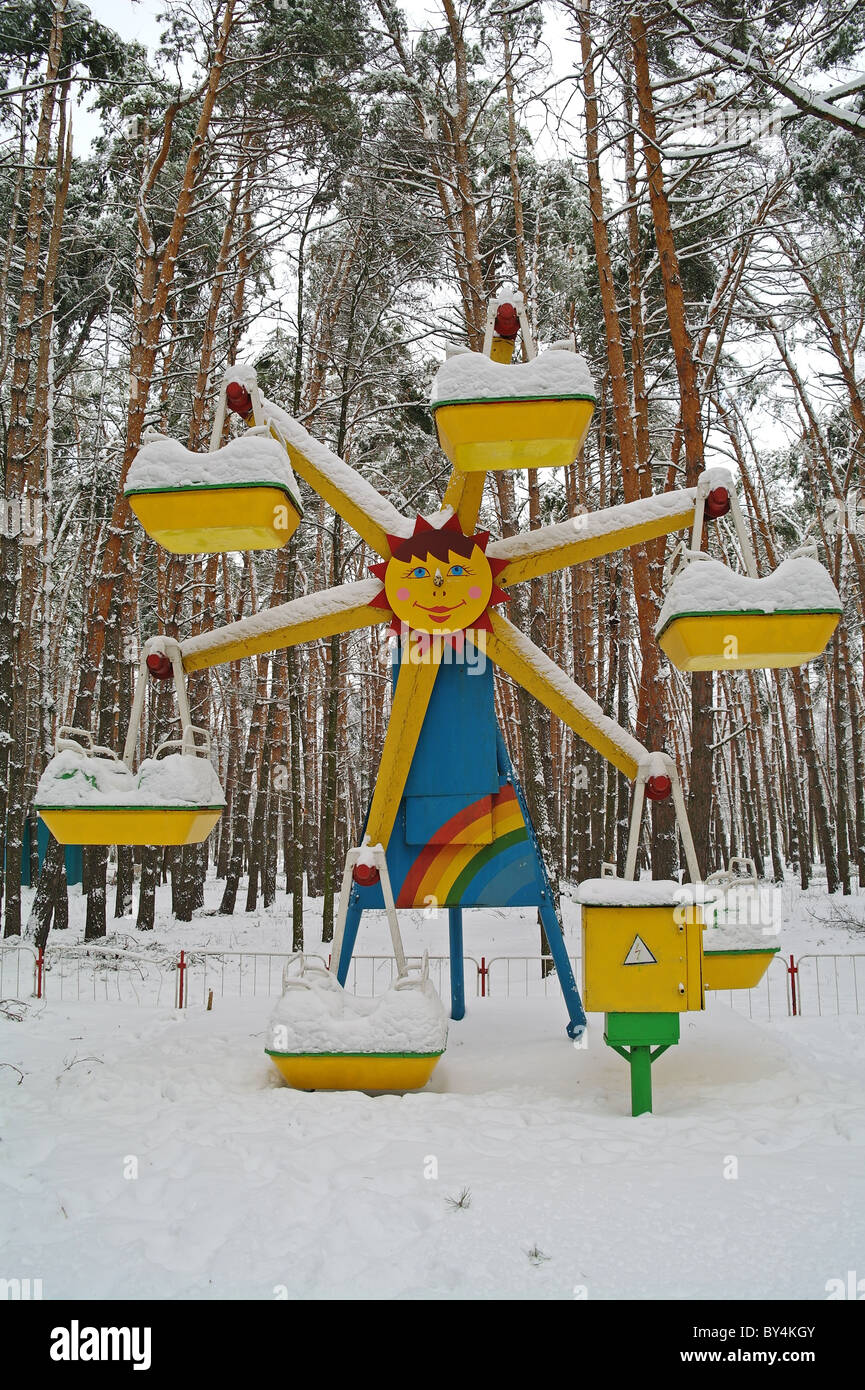 Children's vertical roundabout in park in the winter, Domodedovo, Moscow Region, Russia Stock Photo