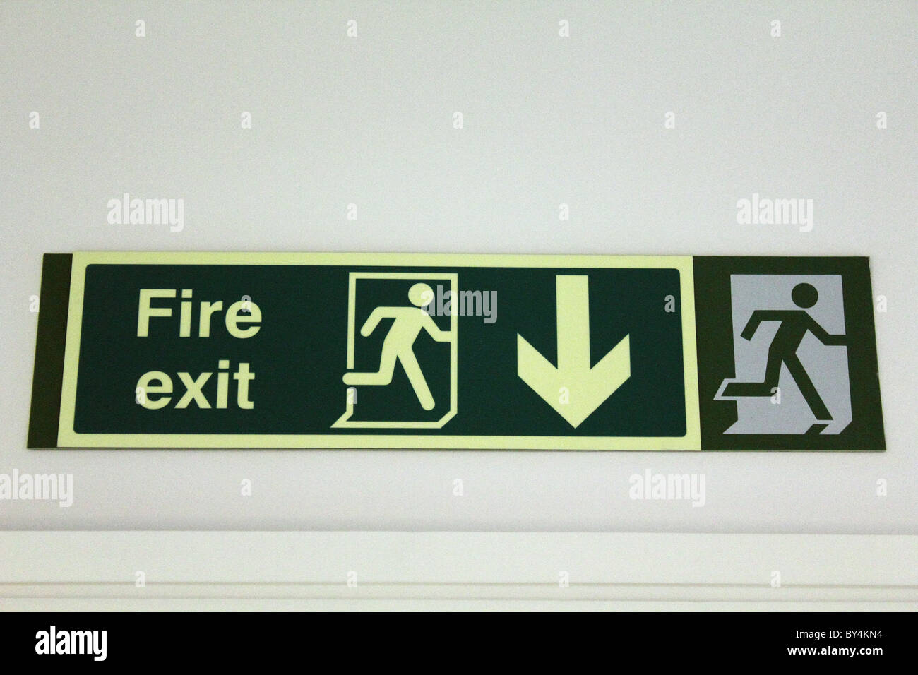 Fire exit escape sign Stock Photo