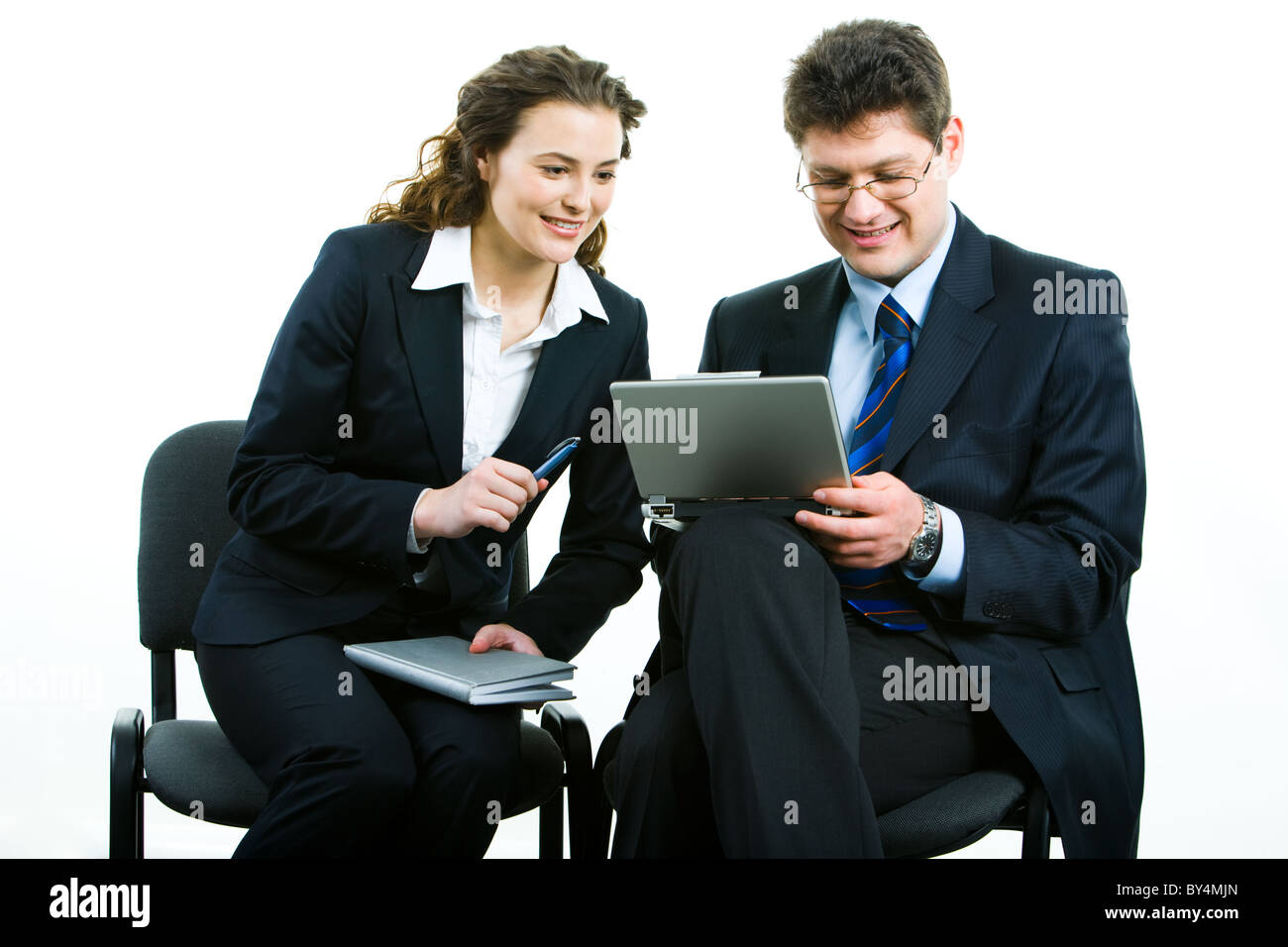 Portrait of business woman and man working together Stock Photo - Alamy
