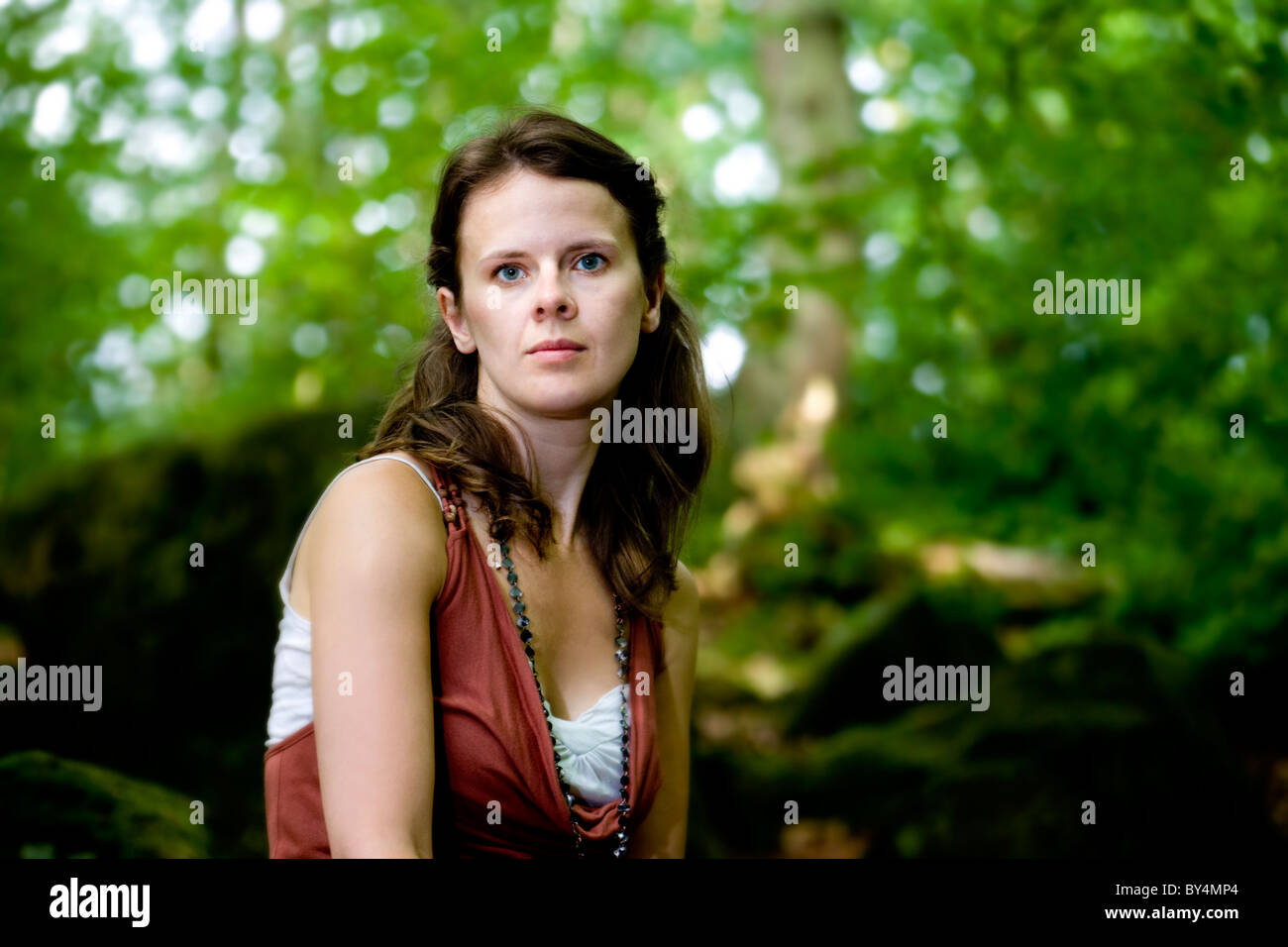 Portrait of a girl in the woods Stock Photo - Alamy