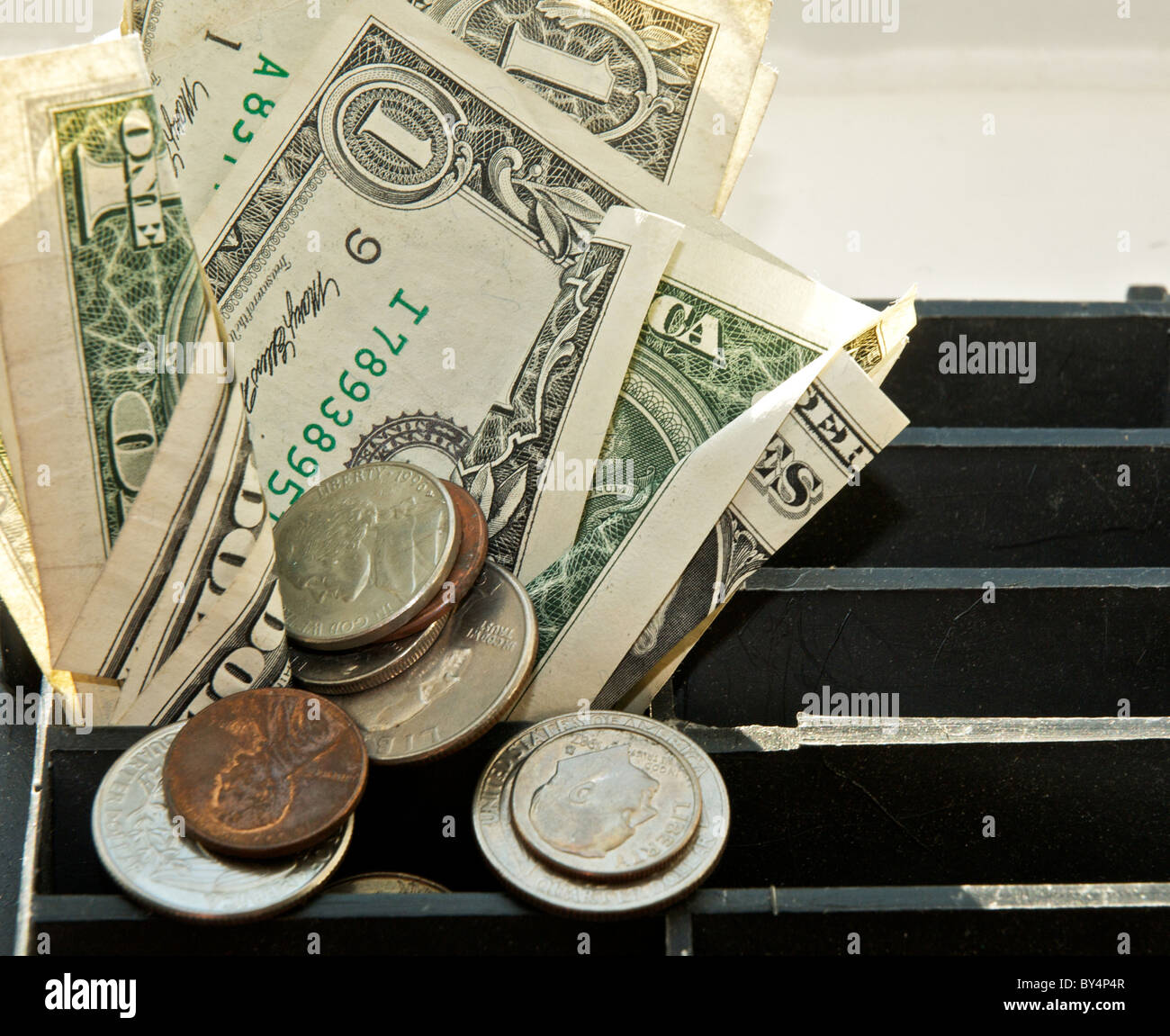 Throw money down the drain hires stock photography and images Alamy