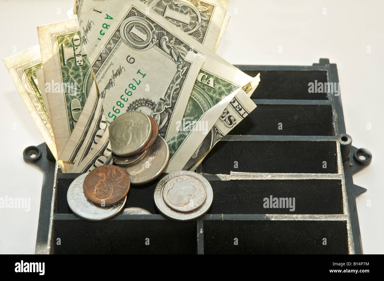 Throw money down the drain hires stock photography and images Alamy