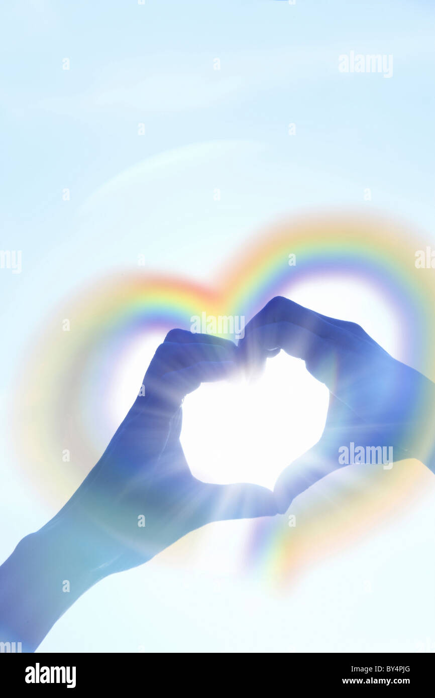 Hands forming a heart shape, Digital enhancement Stock Photo