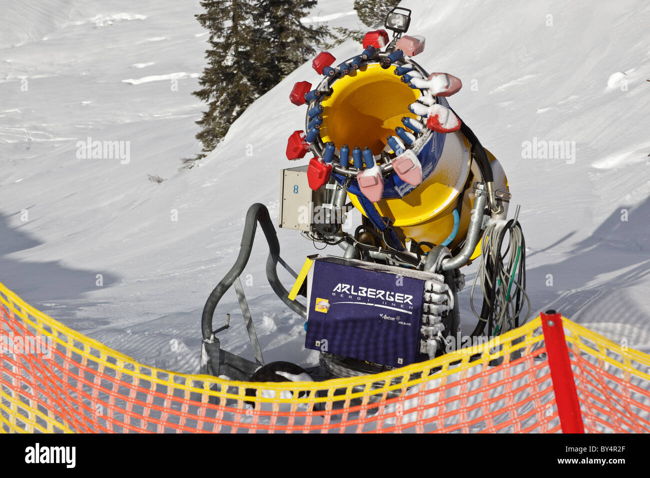 Close up of an artificial snow making machine at the side of the piste