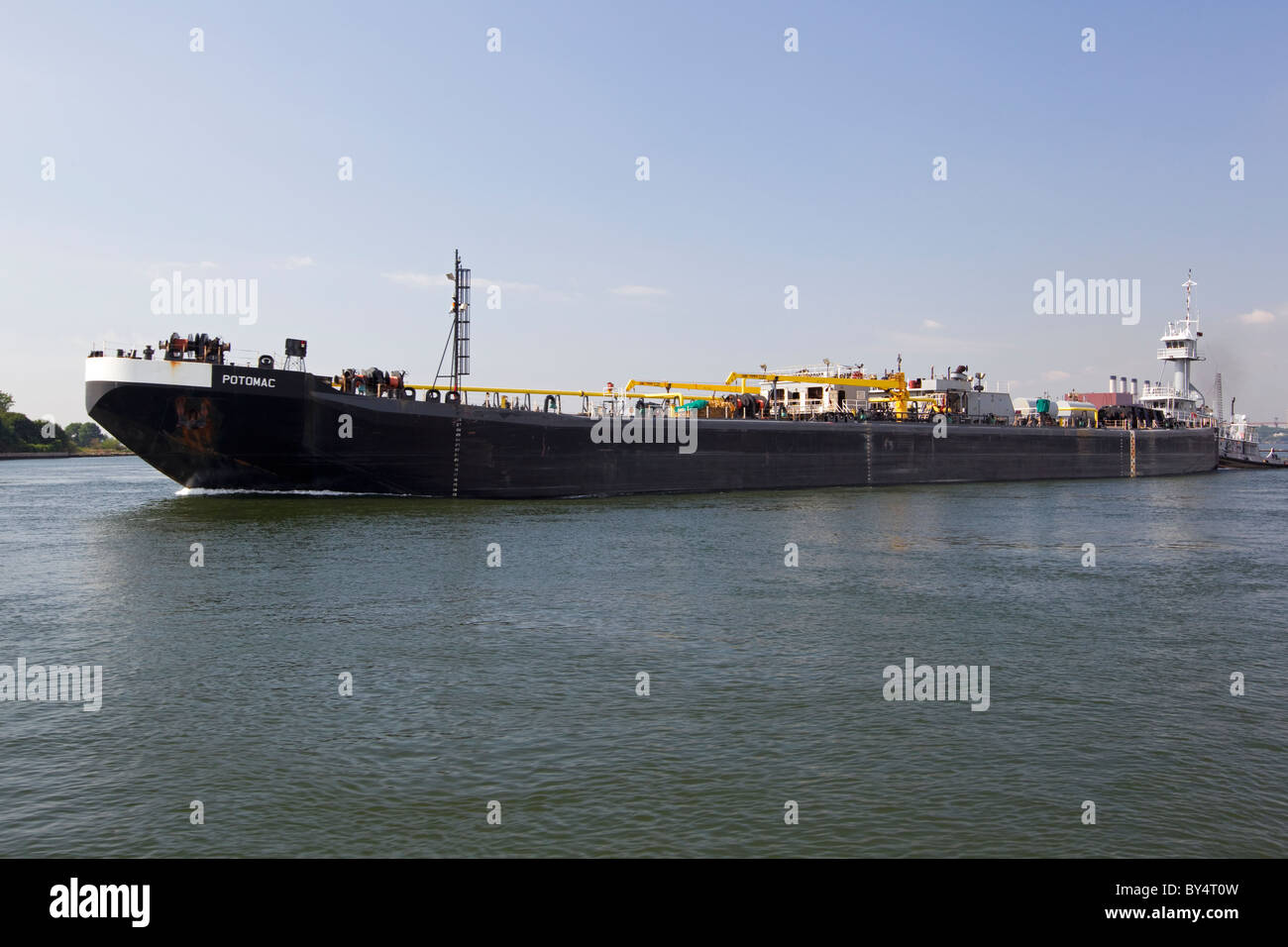 Freighter ship in harbor Stock Photo
