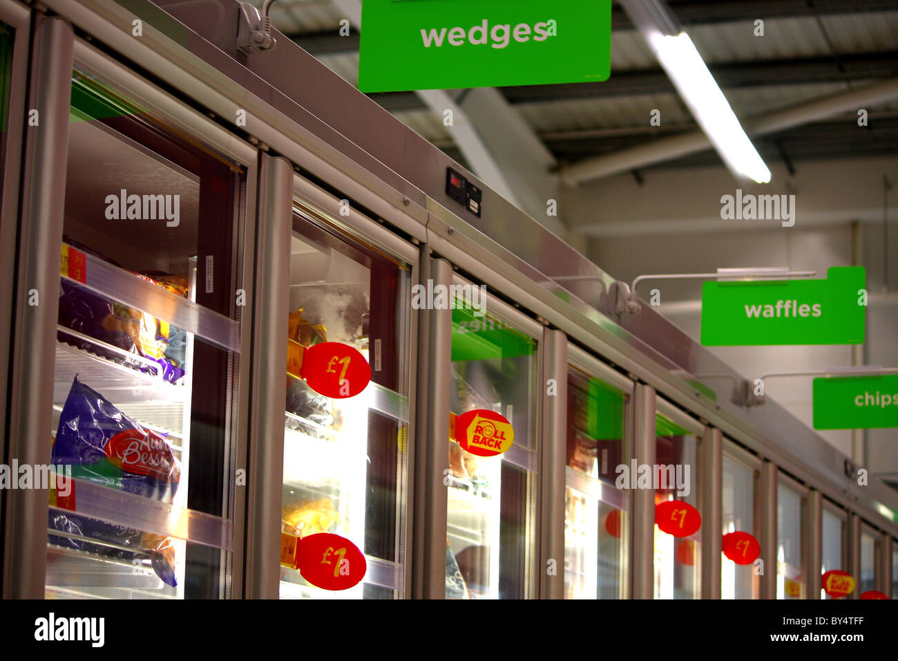 Food bargains at Asda's supermarket; showing freezer food products at competitive prices after the VAT rise in 2011 Stock Photo