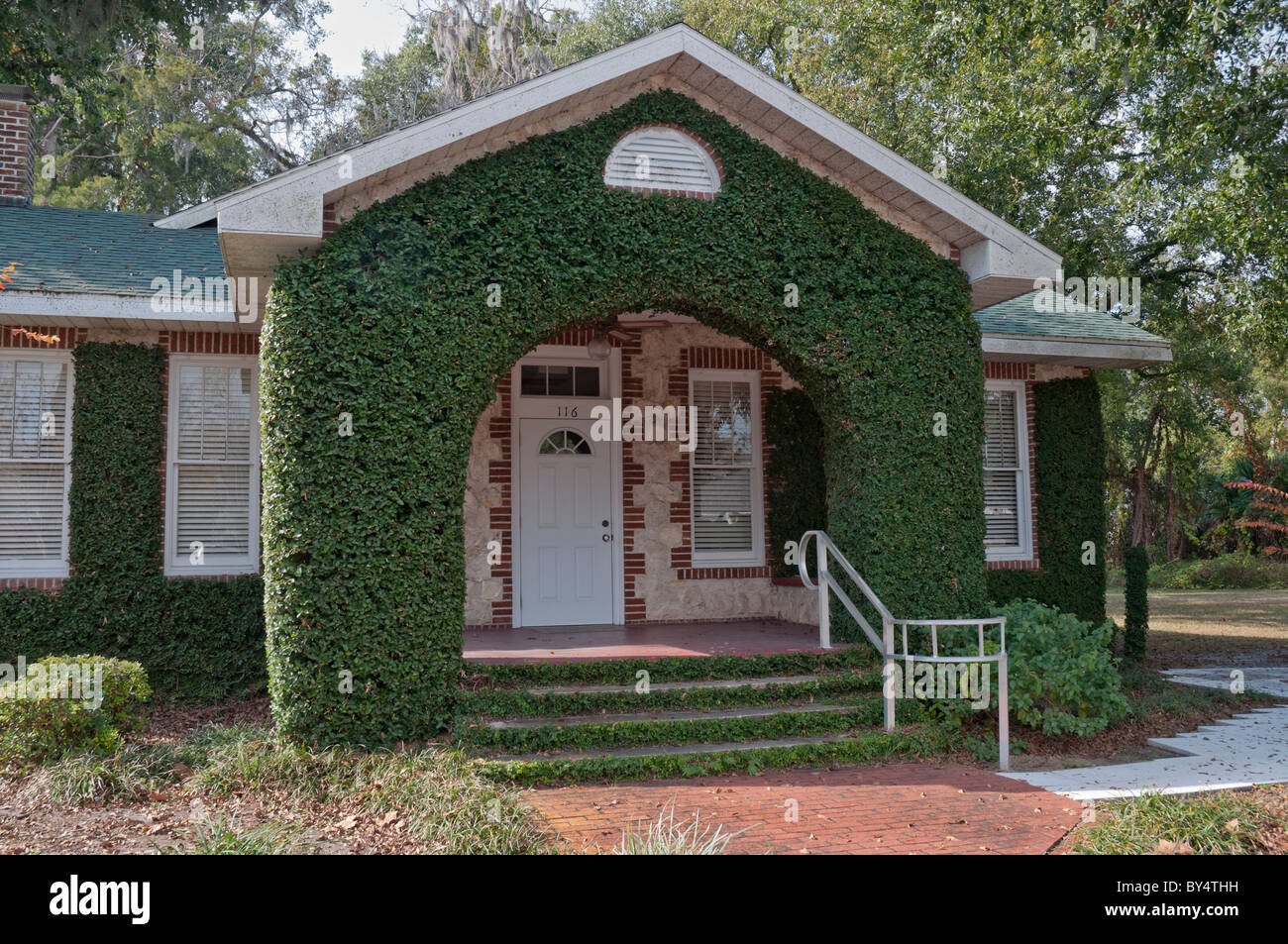 Ivy covered cottage converted into an office in the small town of