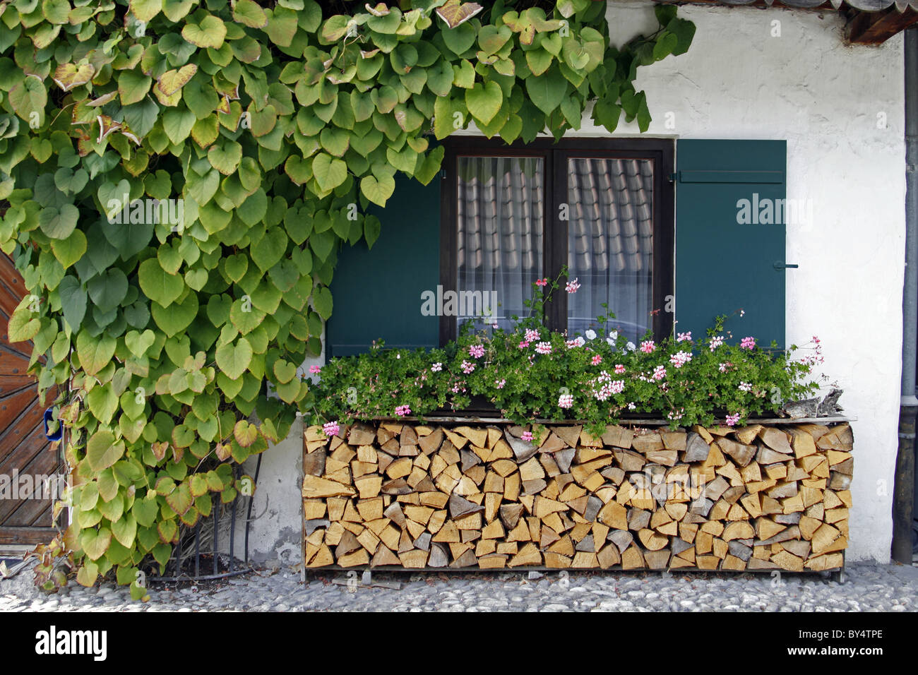 Germany Bavaria Garmisch-Partenkirchen Fruhling Strasse decorated bavarian buildings with balconies and flowers architecture Stock Photo