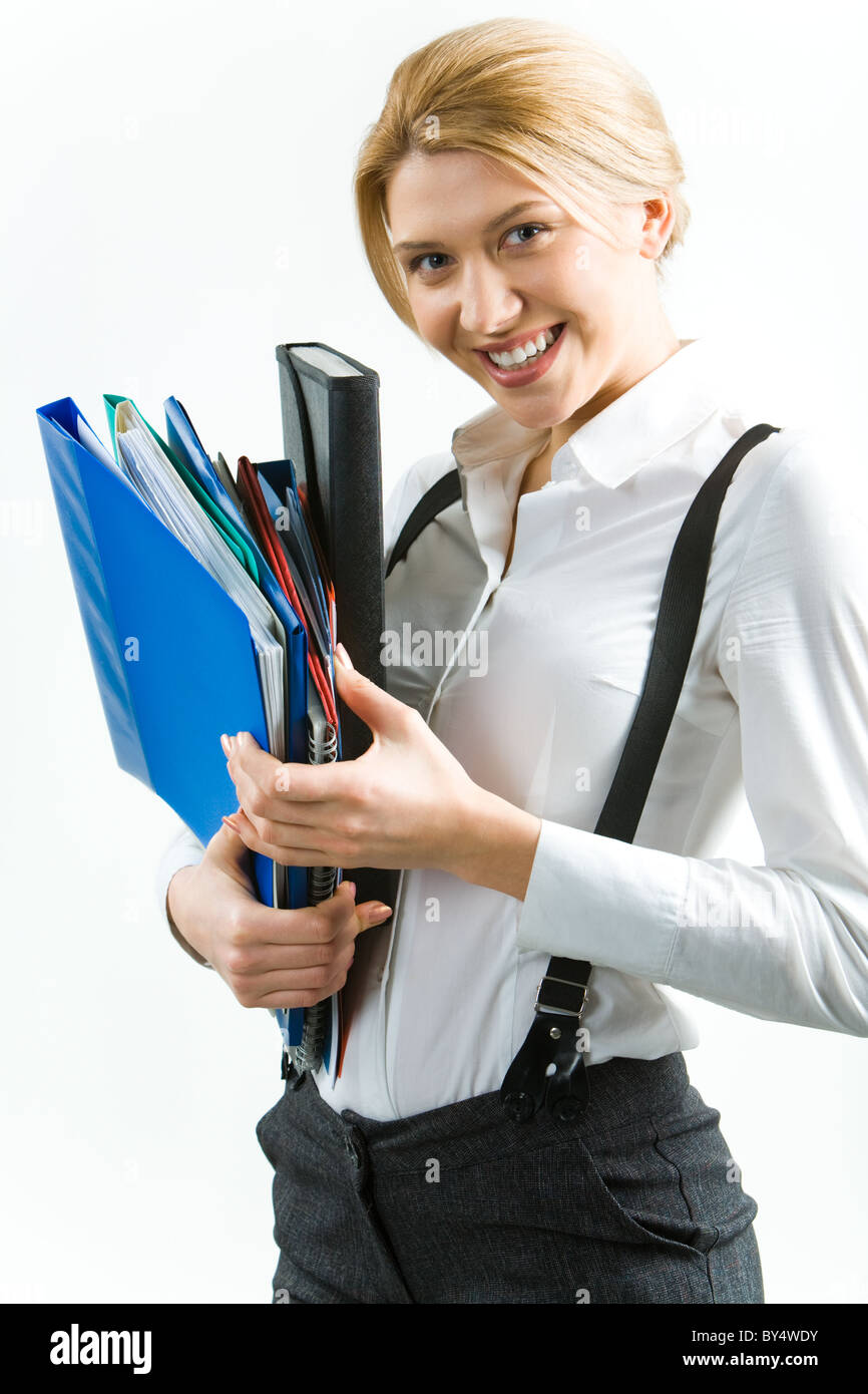 Portrait of attractive smiling student holding the folders Stock Photo