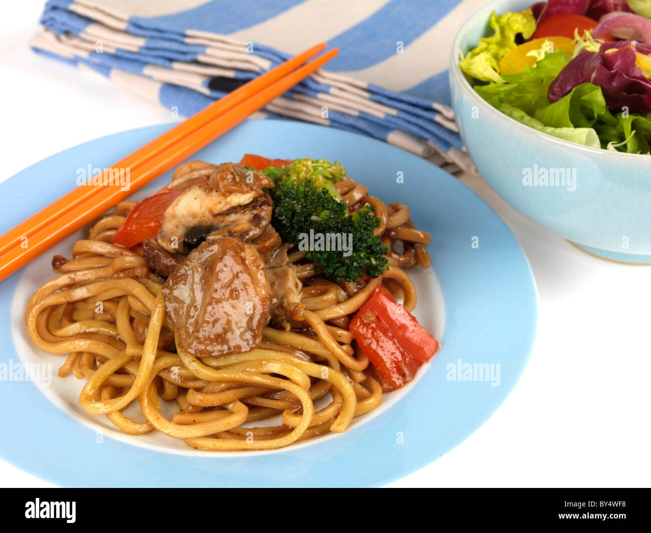 Freshly Cooked Stir Fried Chinese Char Sui Pork With Noodles Against A White Background With No People Stock Photo