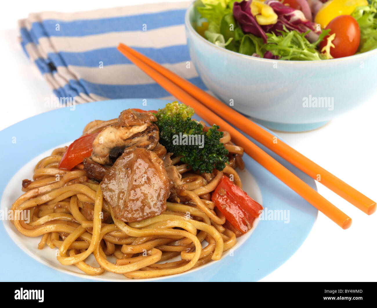 Freshly Cooked Stir Fried Chinese Char Sui Pork With Noodles Against A White Background With No People Stock Photo