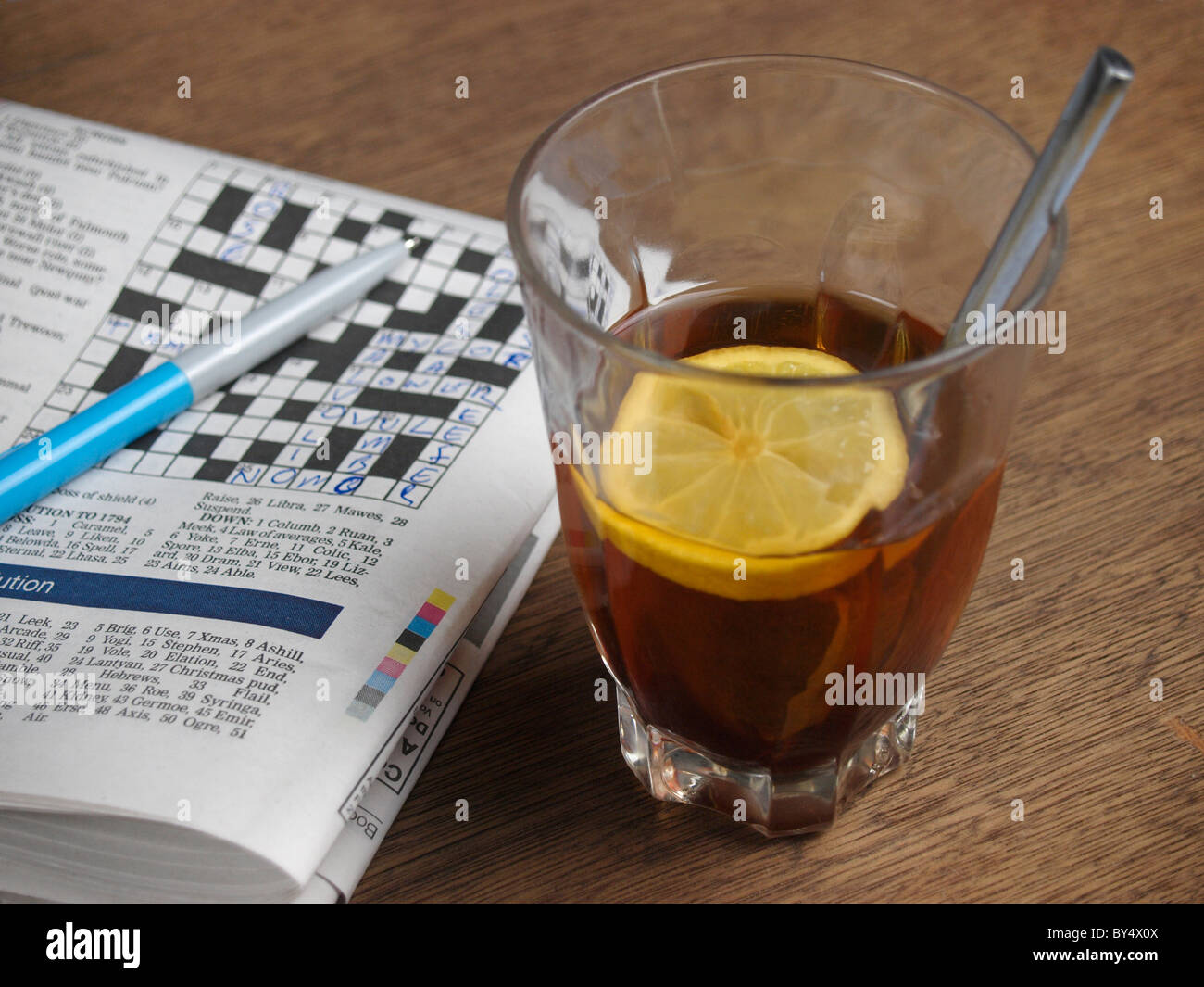 Lemon Tea and a crossword Stock Photo Alamy Lemon Tea and a crossword Stock Photo Alamy