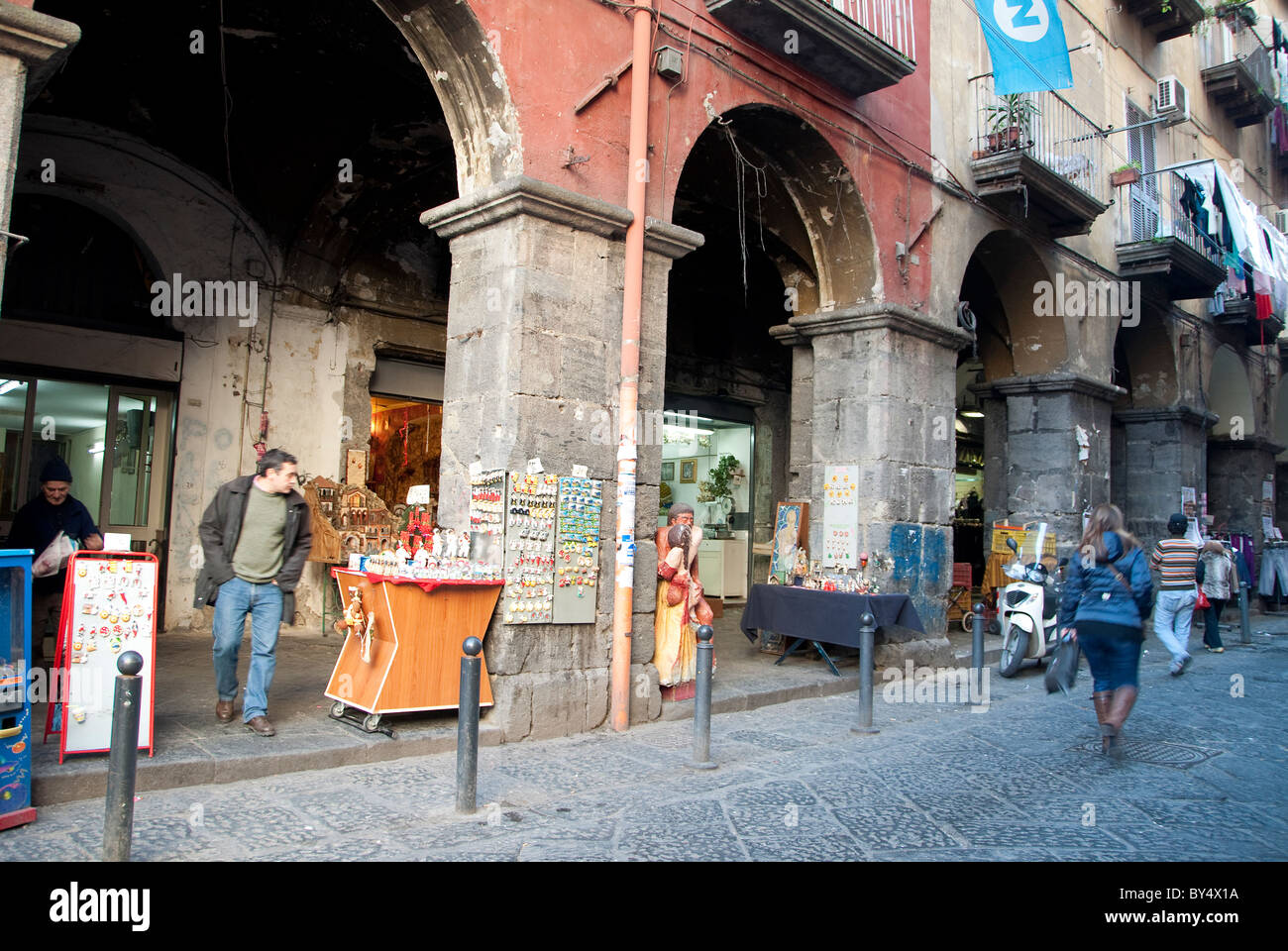 Arcaded part of the street in the Spaccanapoli (street) area of Naples Stock Photo