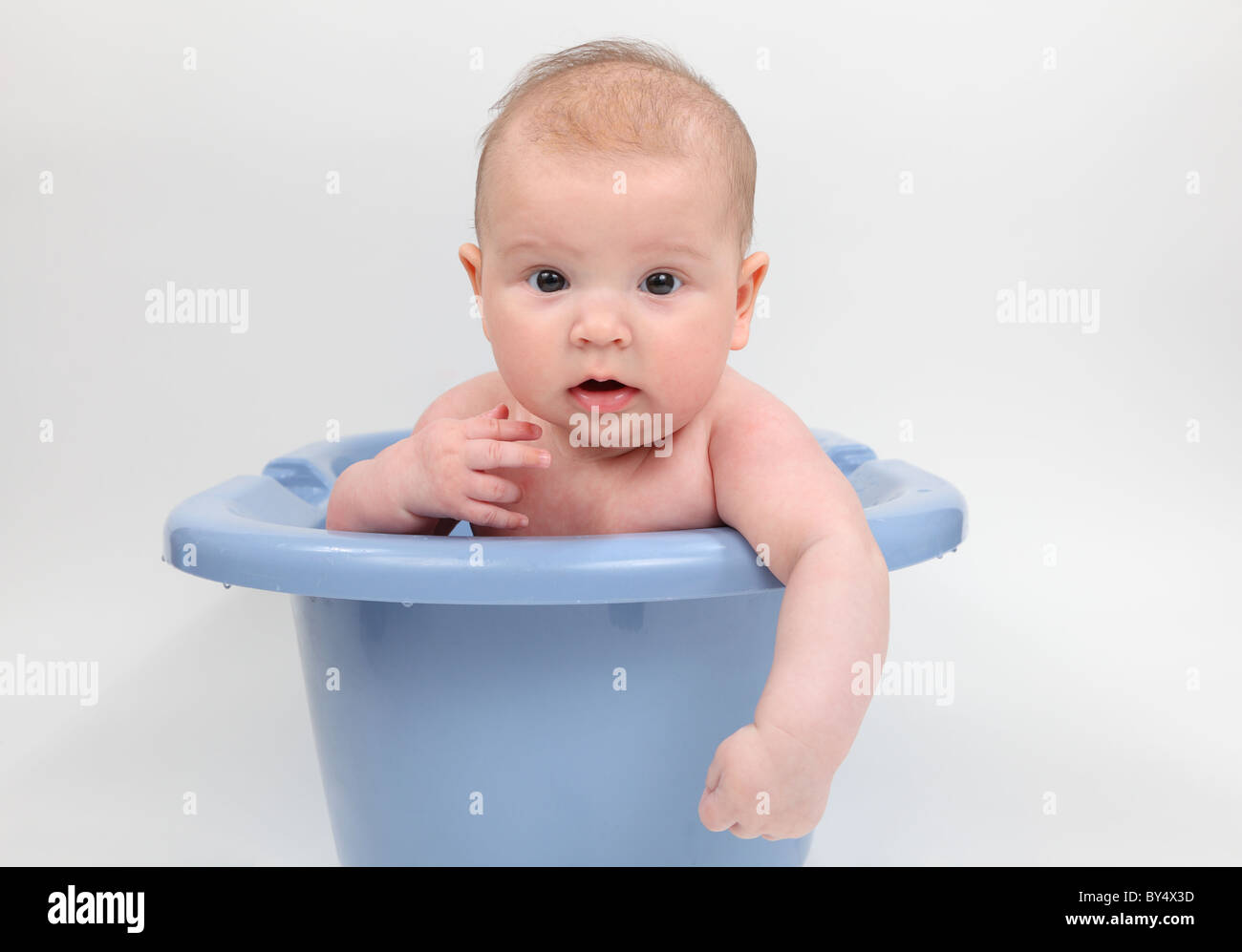 Three month old baby in a bathtub Stock Photo Alamy