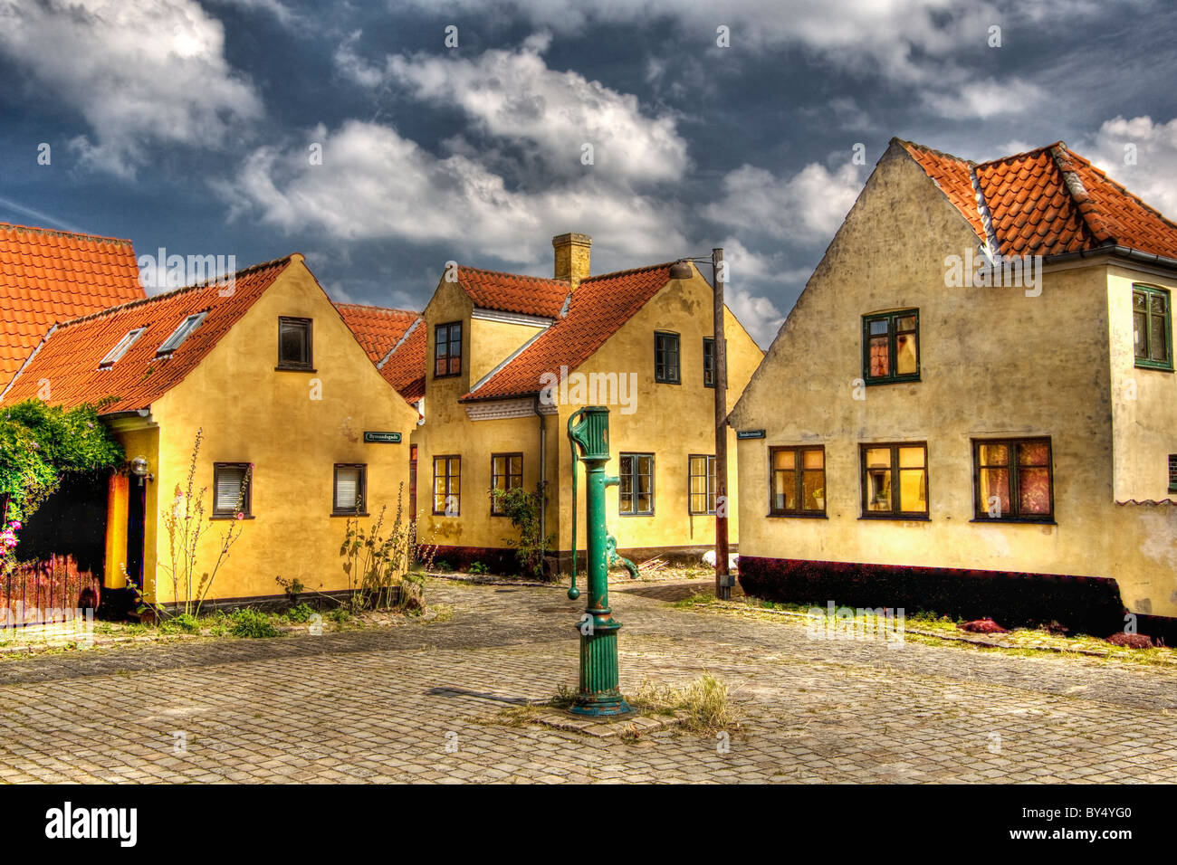 Beautiful yellow houses in the village Dragor in Denmark Stock Photo