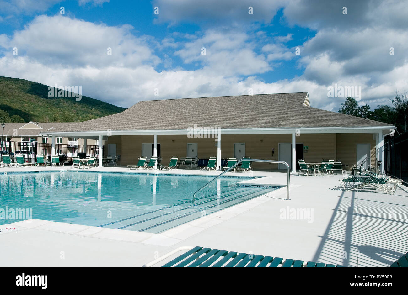 The Vacation Village pool is in the midst of the Berkshire Mountains and adjacent to Jiminy Peak Resort. Stock Photo