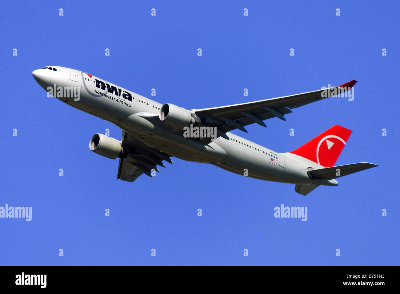 Airbus A330 operated by NWA climbing out after take off from London Heathrow Airport Stock Photo
