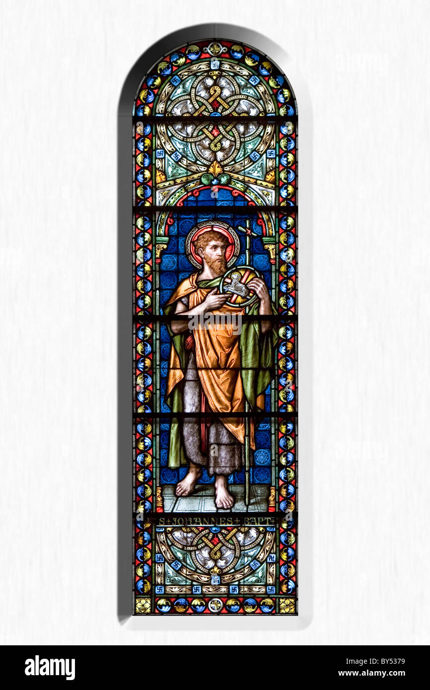 St. John the Baptist subject in stained glass in a church window Stock Photo