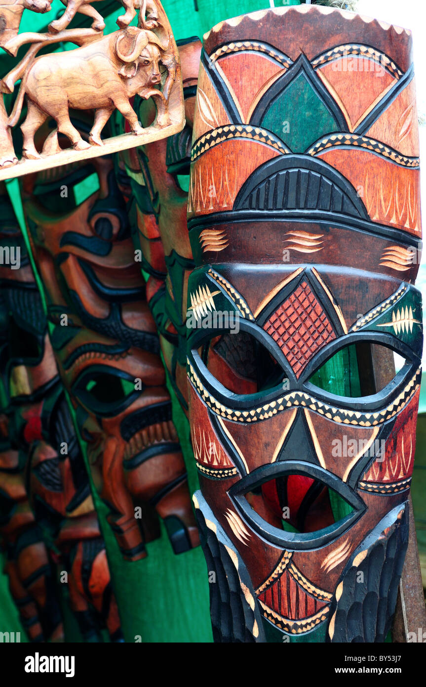 Wood carved masks for sale as souvenirs at the market. Cape Town, South