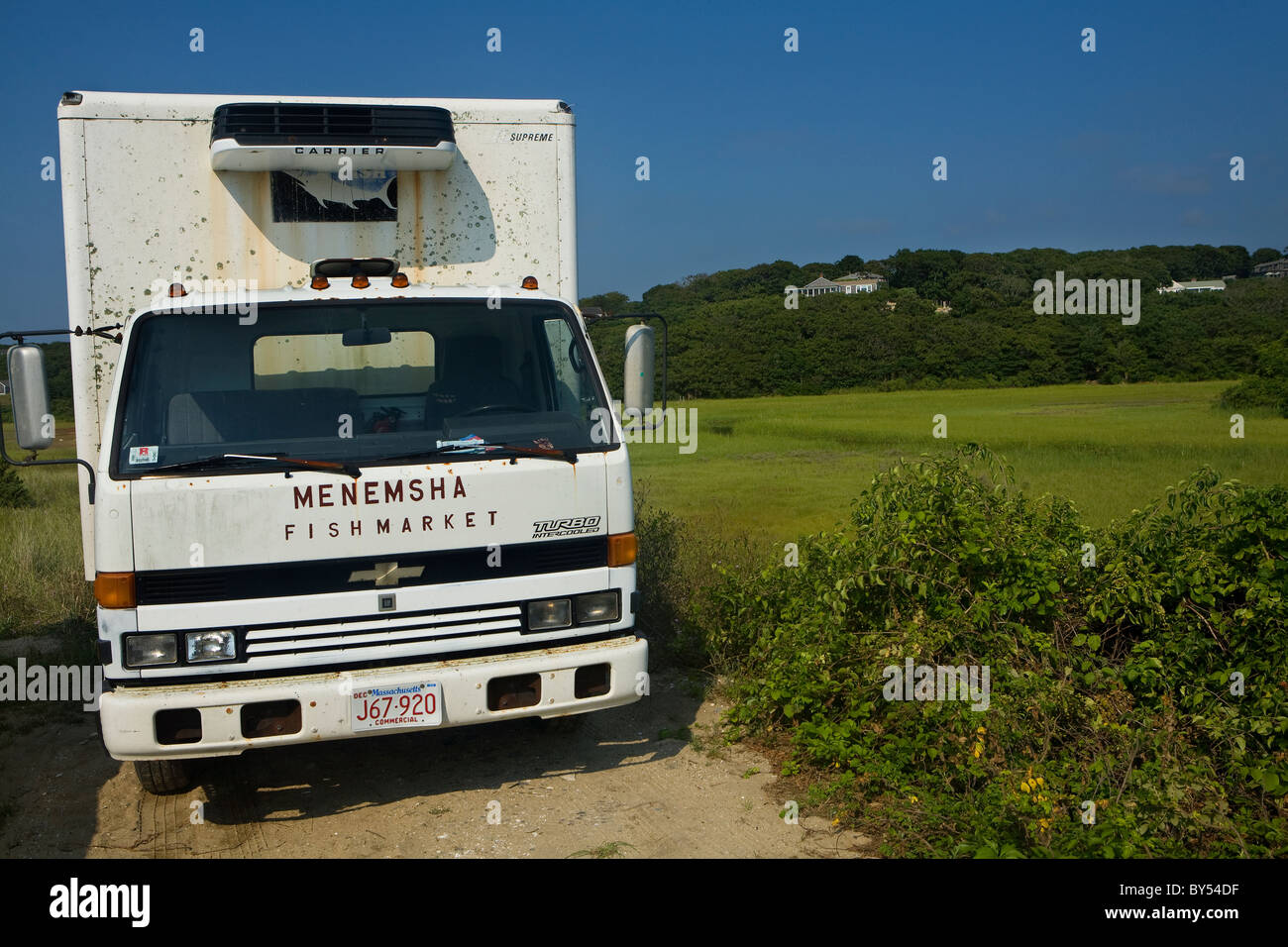 Menemsha Fish Market truck parked alongside the marshes, Menemsha, Martha's Vineyard, Cape Cod, Massachussets Stock Photo